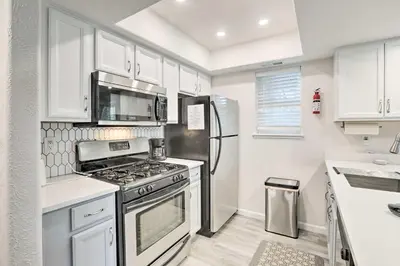 a kitchen with a stove and a refrigerator at Less Than 1 Mi to Slopes! Heavenly Daze Chalet in Tahoe in Stateline