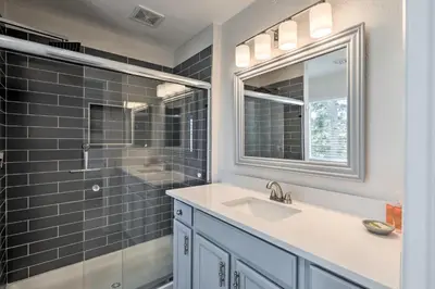 a bathroom with a sink and a shower and a mirror at Less Than 1 Mi to Slopes! Heavenly Daze Chalet in Tahoe in Stateline