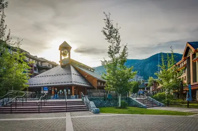 a building with a clock tower on top of it at Cozy Cabin Retreat in South Lake Tahoe