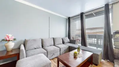 a living room with a couch and a table at Krystal Villas East #312 condo in Mammoth Lakes