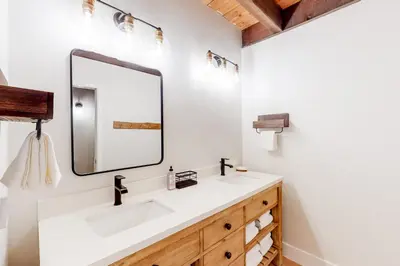 a bathroom with a sink and a mirror at Kingswood Village 2 in Kings Beach
