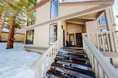 a house with snow on the ground in front of it at Kingswood Village 2 in Kings Beach