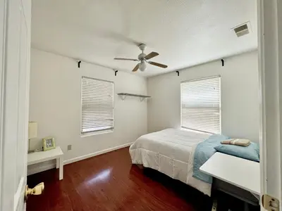 a bedroom with a bed and a ceiling fan at WHOLE Family - Wholestyl in Sacramento