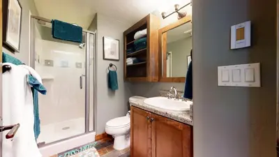 a bathroom with a sink and a shower and a toilet at Woodwinds #1271 townhouse in Mammoth Lakes