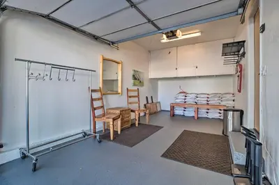 a room with two chairs and a table in it at Epic Mammoth Lakes Getaway with Shared Pool, Hot Tub in Mammoth Lakes