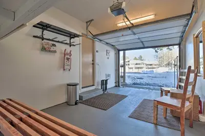 a room with a bench and a chair and a window at Epic Mammoth Lakes Getaway with Shared Pool, Hot Tub in Mammoth Lakes