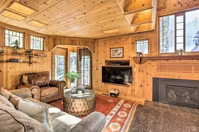 a living room with a couch and a fireplace at Less Than 1 Mi to Heavenly Lifts Tahoe Area Townhome! in Stateline
