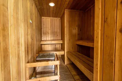 an empty sauna with wooden walls and wooden floors at Hidden Valley Village #103 nicely updated 1 bedroom 1 bathroom condo short 10 min walk from Village in Mammoth Lakes
