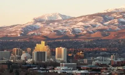 a view of a city with a snow covered mountain at DT Reno - 4BR Home with Patio, BBQ Grill, Games Room in Reno