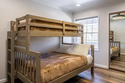 a bedroom with a bunk bed in a room at Ski in Ski Out 3 Bedrm 3 Bathrm fully remodeled Sierra Megeve Condo Steps to Canyon Lodge Sleeps 8 in Mammoth Lakes