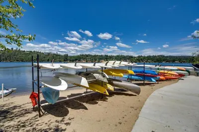 a bunch of boats are lined up on the beach at Fun In The Sun Cabin in Groveland