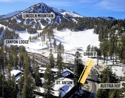 a snow covered mountain with a train on top of it at St, Anton #54 condo in Mammoth Lakes