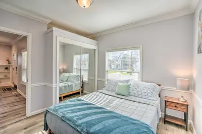 a bedroom with a bed and a mirror at Pet-Friendly Sacramento Home about 5 to Downtown! in Sacramento