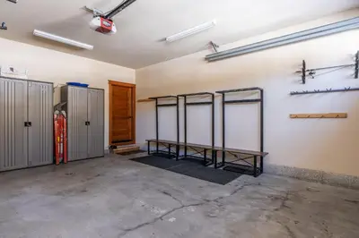 a room with a row of stalls in a garage at Newly Updated Red Slate 4 is a 4 Bedrm 3 full Bathrm Townhome Close to Canyon Lodge That Sleeps 10 in Mammoth Lakes
