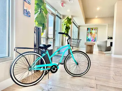a blue bike is parked in a room at Designer Apt with Jacuzzi, Pool & Mountain Views in Sparks