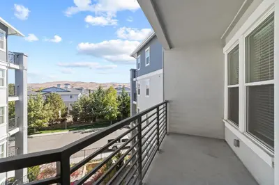 a balcony with a view of a street at Chic Apt with Jacuzzi, Pool Nr Casino & Shopping in Sparks