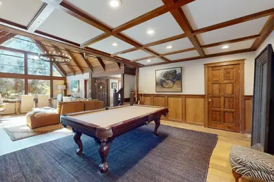 a living room with a pool table in it at The Chalet in Zephyr Cove