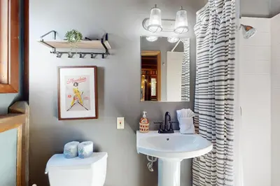 a bathroom with a sink and a mirror at The Chalet in Zephyr Cove