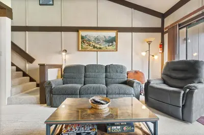 a living room with two couches and a coffee table at Relaxing, Well Furnished Condo! - Creekside #29 in Bear Valley