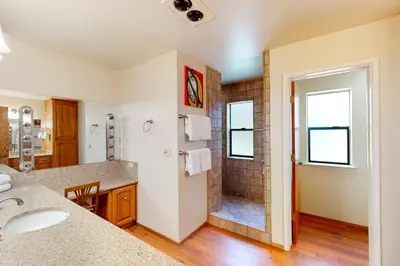 a bathroom with a shower and a sink at Alder Lake View Lodge in Bass Lake