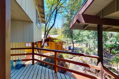 a view from the balcony of a house at Todds Lakefront House in Bass Lake