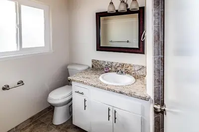 a bathroom with a sink and a toilet at Pine Ridge Peak in Oakhurst