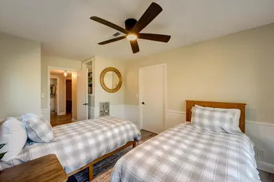 a bedroom with two beds and a ceiling fan at Lake Lookout in Stateline