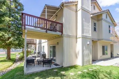 a house with a deck and a patio at Northshore Lakeview Getaway in Bass Lake