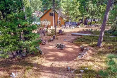 an aerial view of a house in the woods at Bearvista in Arnold