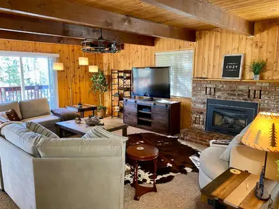 a living room with a couch and a fireplace at Bearvista in Arnold