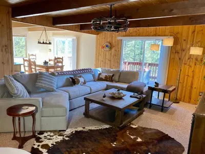 a living room with a couch and a table at Bearvista in Arnold