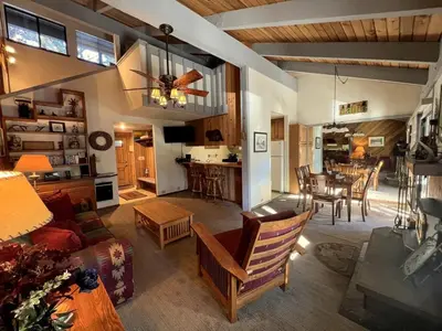 a living room with a couch and a table at 2 Bedrooms Standard Condos in Mammoth Lakes