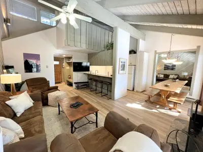 a living room with a couch and a table at 2 Bedrooms Standard Condos in Mammoth Lakes