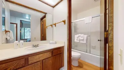 a bathroom with a sink and a toilet at Discover 4 in Mammoth Lakes
