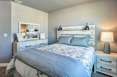 a bedroom with a bed and a mirror at Modern Sacramento House about 12 Mi to Downtown! in Sacramento
