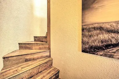 a painting of stairs on the side of a building at Luxury Auberry Retreat in Sierra National Forest in Auberry