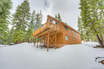 a cabin in the woods in the snow at Bolzano's Getaway in Truckee