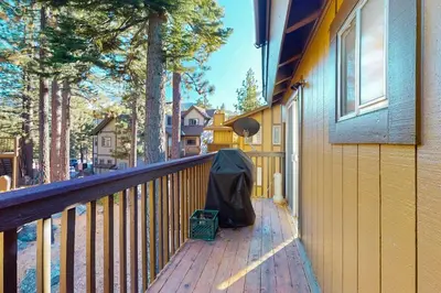 a porch of a house with a tent on it at Lake Village Townhouse B in Zephyr Cove