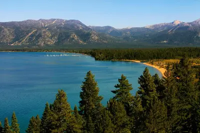 a view of a lake with trees and mountains at Allen Way Escape in Incline Village