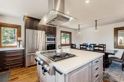 a kitchen with a stainless steel stove top oven at Tyner Dreams in Incline Village