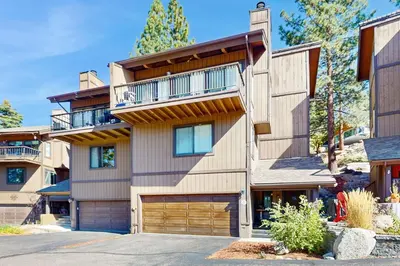 a large apartment building with a garage at Katherine Court Townhouse in Stateline