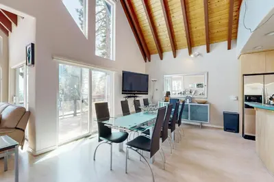 a dining room with a table and chairs at Lake View Escape in Incline Village