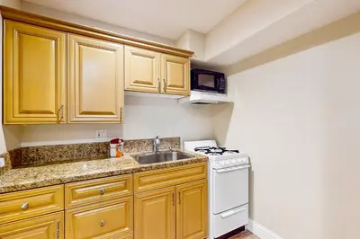 a small kitchen with a sink and a stove at Boothill Adventures in Incline Village