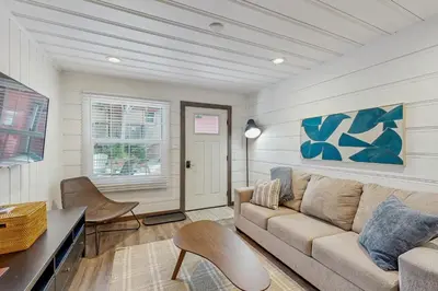 a living room with a couch and a table at Manzanita Holiday 4 in South Lake Tahoe