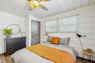a bedroom with a bed and a ceiling fan at Manzanita Holiday 4 in South Lake Tahoe
