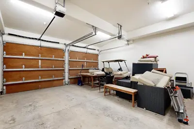 a room with a garage with a table and chairs at Sagebrush Charms in Truckee