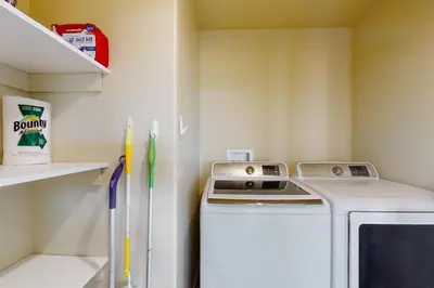 a small kitchen with a stove and a refrigerator at Tahoe Keys Haven in South Lake Tahoe
