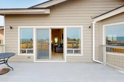 a house with sliding glass doors on a patio at Tahoe Keys Haven in South Lake Tahoe