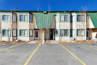 an empty parking lot in front of a house at Cove 141 in South Lake Tahoe