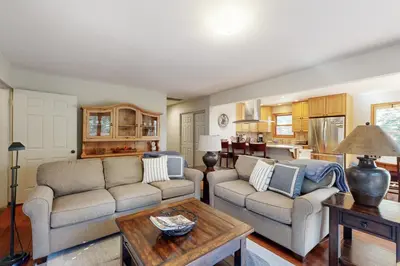 a living room with two couches and a table at Zermatt Getaway in Truckee